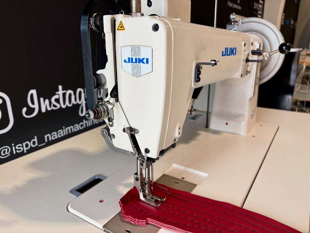 Industriële JUKI TNU-243 naaimachine voor professioneel gebruik, ideaal voor leer, canvas en dikke stoffen.